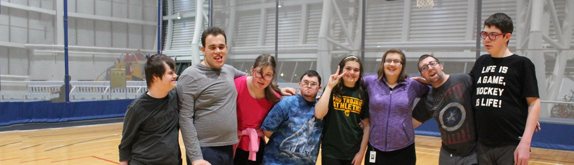 A collection of Abilities Centre participants including Thrive program members enjoying time in the Fieldhouse 